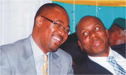 FRED24111001 Rivers State Governor, Rt. Hon. Chibuike Rotimi Amaechi (right) chatting with Permanent Secretary, Federal Ministry of National Planning, Prof Sylvester Monye, during a two-day South-South zonal dialogue and policy sensitisation workshop organised by United Nations Development Programme (UNDP) and Nigeria Governors’ Forum (NGF) in Port Harcourt, yesterday. Photo: Chris Monyanaga