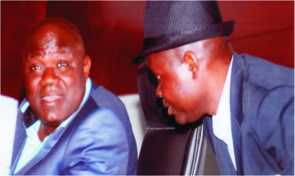 FRED011202 Speaker, Rivers State House of Assembly, Rt. Hon. Tonye Harry (left) listening to House Committee chairman on Local Government, Hon Ikuinyi-Owaji Ibani, during the sitting of the House, yesterday. Photo: Chris Monyanaga