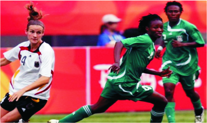 Super Falcons’ striker, Perpetua Nkwocha (middle) during  last week’s friendly with Germany