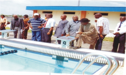 FRED15121003 Members of the Main Organising Committee (MOC) and Local Organising Committee (LOC) of the 17th National Sports Festival, inspecting the ultra-modern swimming pool at University of Port Harcourt, one of the facilities for the Garden City Games.