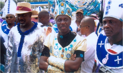 FRED20121001 Rivers State Governor, Rt. Hon. Chibuike Rotimi Amaechi (middle) flanked by his Cross River State counterpart, Mr Liyel Imoke (left) and state Commissioner for Culture and Tourism, Mr Marcus Nle-Ejii (right), during the 2010 CARNIRIV street parade, last Saturday. Photo: Donatus Ken