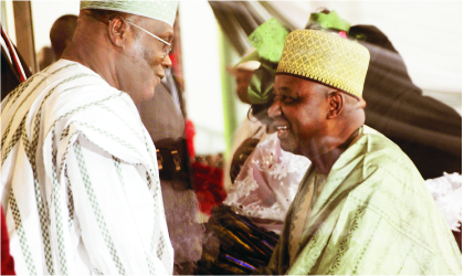 FRED17011102 People’s Democratic Party (PDP) presidential aspirant and former Vice President Atiku Abubakar (left) with Vice President Namadi Sambo, during the PDP Convention in Abuja, last Thursday.