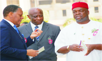 L-R: Ministers of Foreign Affairs, Chief Odein Ajumogobia, Interior, Capt. Emmanuel Iheanacho and Labour, Chief Emeka  Nwogu  during  the Armed Forces Remembrance Day Service in Abuja, on Sunday.