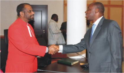 Rivers State Governor, Rt Hon Chibuike Amaechi (right) welcoming the Chaplain to Queen of England, Rev. Canon George Kovoor to Government House, Port Harcourt, during a courtesy visit to Rivers State, on Monday.