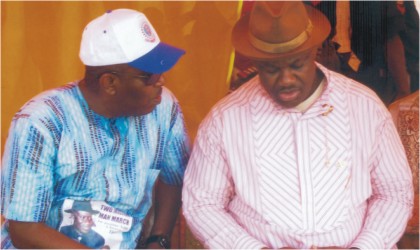 FRED26011102 Rivers State Deputy Governor, Engr Tele Ikuru (right) chatting with the Special Adviser to the Governor on Niger Delta Development Commission (NDDC),Mr Godknow Tam-George during a public function in Port Harcourt, recently.