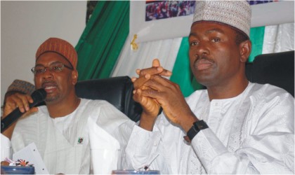 FRED28011103 Minister of Tourism, Culture and National Orientation, Alhaji Abubakar Mohammed (left), presenting his 2010 score card in Abuja, yesterday. With him is the Minister of Information and Communications, Mr Labaran Maku.