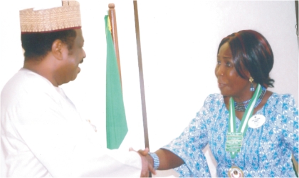 FRED31011102 Hon Minister of State for Health, Alhaji Suleman Bello in a handshake with the District Governor, Lions Clubs International District 404A (Nigeria) Lion Dame Joy Peterba Warmate, when she paid a courtesy visit, in Abuja, recently.