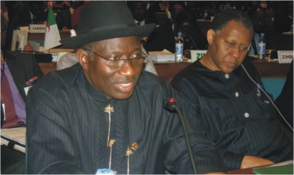 FRED02021101 President Goodluck Jonathan (left) delivering his speech at the 16th African Union (AU) Summit in Addis Abba, on Sunday. With him is the Foreign Affairs Minister, Mr Odein Ajumogobia