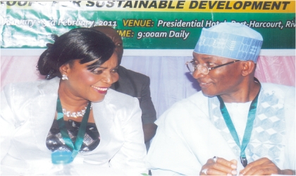 Permanent Secretary, Federal Ministry of Women Affairs, Alhaji Idris Kuta (right) chatting with his colleague from Women Affairs, Dr Pat Ogbunaga, during the 13th Regular Council Meeting of the National Council on Women Affairs and Social Development, at Hotel Presidential, Port Harcourt, on Monday.