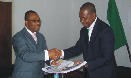 FRED18021102 General Manager, Rivers State Newspaper Corporation (left) presenting some copies of The Tide Newspapers to the Executive Director of Rivers State Sustainable Development Agency, Mr Noble Pepple, during his visit to the corporation, yesterday.
