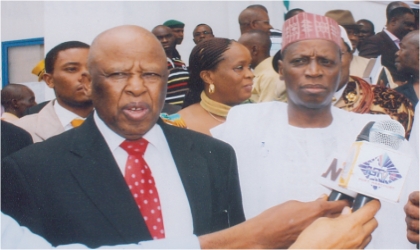 FRED21021103 Former Botswana President, Festus Mogae (left) fielding questions from newsmen at the memorial lecture in honour of late Prof Claude Ake held in Port Harcourt. With him is the Minister of National Planning, Dr Shamsudeen Usman. Photo Chris Monyanaga