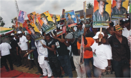 Rivers State Governor, Rt Hon Chibuike Rotimi Amaechi (inset) addressing his teeming supporters who trooped out in their numbers displaying their solidarity, during the flag-off of the governor’s re-election campaign in Isiokpo, headquarters of Ikwerre Local Government Area, yesterday