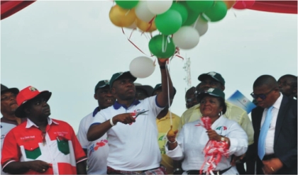 Rivers State Governor, Rt Hon Chibuike Rotimi Amaechi (middle) releasing balloons during the Peoples Democratic Party (PDP) governorship re-election rally in Emohua, on Wednesday