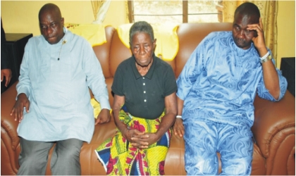 Former Secretary to State Government, Hon.Magnus Abe (right),Chairman Gokana LGA, Chief Victor Giadom (left) and Mrs Bakbe Gbarazie  mother of slain Pius Gbarazia,during a condolence visit to the family, at Kemzoo community Bori in Khana LGA