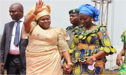 Wife of Nigeria’s President, Dame Patience Jonathan(left) with wife of Rivers State Governor, Dame Judith Amaechi, waving to party supporters during the rally organised to mobilise Rivers women, at Okrika, yesterday.