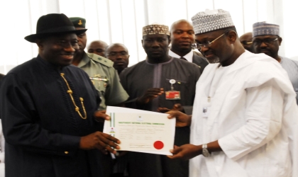 President-elect, President Goodluck Jonathan (left), receive his Certificate of Return from Independent National Electoral Commission (INEC) Chairman, Prof. Attahiru Jega in Abuja, yesterday.