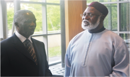 Former South African President, Thabo Mbeki (left) and former Nigerian  Head of State, Abdulsalami Abubakar at the Nigerian Embassy in Washington D.C  after a consultative meeting of the AU Special Panel for Sudan, recently.