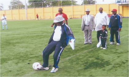 Representative of Head of Service, Esther Anucha,  Permanent Secretary of Establishment, Training & Pension, Mr Gift Ake kicking  off the 2011 Rivers Head of Service Cup competition at the Sharks Stadium, Port Harcourt.