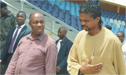 Rivers State Governor,Rt.Hon. Chibuike Rotimi Amaechi (left) conducting Kanu Nwankwo round the new Games Village at the Greater Port Harcourt City, yesterday.