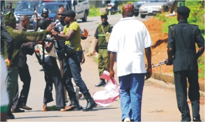 FRED10061102 Security men arresting students of Plateau State Polytechnic and College of Education who are protesting over strike by their lecturers for the past eight months in Jos, yesterday