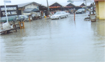 FRED27061102 Flood at the St John’s Bus Stop, Oroworukwo by Aba Road after the heavy down pour in Port Harcourt, last Wednesday