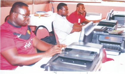 FRED29061101 Journalists at the media centre of the 17th National Sports Festival in Port Harcourt yesterday. Inset, some athletes arriving the Games Village at University of Port Harcourt, Choba, yesterday.