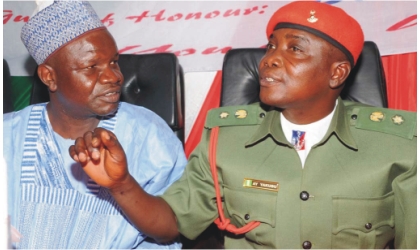FRED30061103 From Left: Representative of Chairman, National Drug Law Enforcement Agency (NDLEA), Muazu Lawal, with the representative of GOC, 3rd Armoured Div., Nigeria Army Jos, Lt.-Col. Aminu Yakubu, at the United Nations International Day Against Illicit Drug Trafficking and Abuse in Jos on Monday