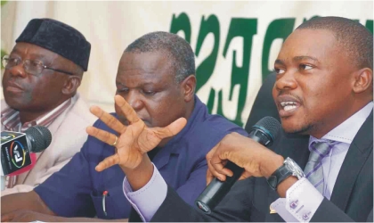 FRED01071103 From right: TUC President, Comrade Peter Esele, NLC President, Comrade Abdulwaheed Omar, and NLC Deputy President, Comrade Promise Adewusi, at a news conference on the implementation of national minimum wage in Abuja, yesterday