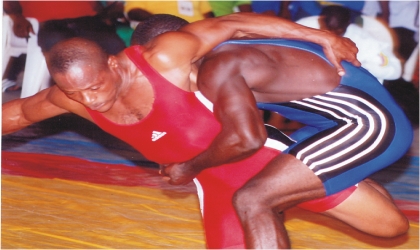 FRED03071101 Lagos and Kaduna state wrestlers took to the mat, yesterday at the ongoing National Sports Festival in Port Harcourt
