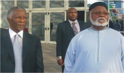 FRED05071103 Former Head of State Abdusalami Abubakar (right) with former President Thabo Mbeki of South Africa, during the 18th extraordinary summit of East African Heads of State and Government in Addis Ababa, yesterday.