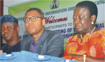 FRED06071102 From Left: Director-general, National Broadcasting Commission (NBC), Mr Yomi Bolarinwa; Director-General, National Films and Video Censor Board, Mr Emeka Mba, and Managing Director, News Agency of Nigeria (NAN), Mrs Oluremi Oyo, at a special session of the National Council on Information and Communications in Abuja, yesterday