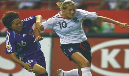 German female player, Popp (10) contesting for the ball against an opponent at the on-going Women World Cup in Germany, yesterday.