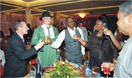 Rivers State Governor. Rt. Hon. Chibuike Amaechi (middle) and his wife, Judith, toasting with the in-coming District Manager of AIRFRANCE KLM, Mr Benoit Autret (left), during the sentforth party of his predecessor, Mr Yann Gilbert (2nd left) at Goverment House Port Harcourt, last Tuesday.