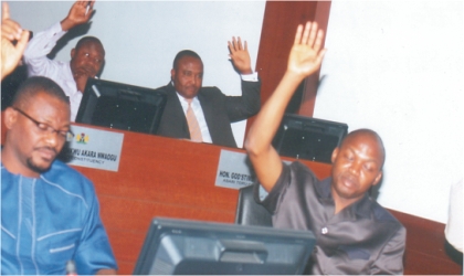 A cross section of Rivers State lawmakers  voting in support of a motion for the state government to bring back  indigenes from Borno State, yesterday. Photo: Chris Monyanaga