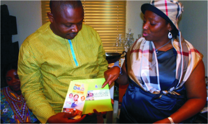 Wife of Rivers State Governor, Dame Judith Amaechi with Head of ESI/Ministry of Health Medical Mission, Dr Sampson Parker thereby displaying a document during a partnership meeting at ESI secretariat.