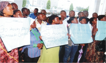 Indigenes of Okomakiri in Okrika Local Government Area, demonstrating against Shell Petroleum Development Company, at the Rivers State House of Assembly, yesterday.