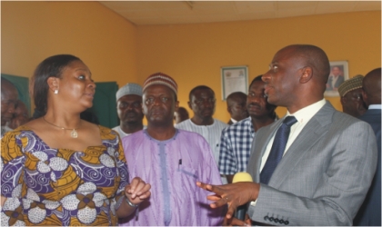 FRED27071101 Rivers State Governor, Rt. Hon. Chibuike Rotimi Amaechi (right) explaining a point to the Director-General of Security and Exchange Commission, Ms Arumna Oteh and members of her team, during an inspection visit to project sites in Rivers State, yesterday.