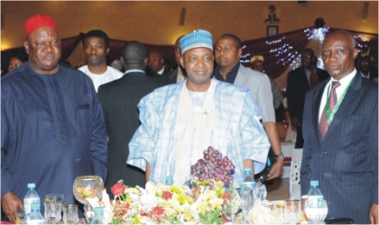FRED29071103 From Left: Secretary to the Government of the Federation, Sen. Anyim Pius Anyim; Vice President Namadi Sambo, and Chairman, Board of Directors, Nigerians in Diaspora Organisation, Mr Ganiya Dada, at a dinner in Abuja on Wednesday.