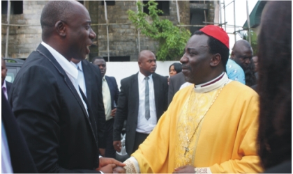 Rivers State Governor, Rt Hon Chibuike Rotimi Amaechi (left) being welcomed by ArchBishop Sam Amaga of Foundation Faith Church Worldwide during the dedication service of The City of Faith Cathedral held in Port Harcourt, yesterday