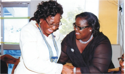 ; Rivers State Information and Communications Commissioner, Mrs Ibim Semenitari (right) chatting with Rotarian Georgiana Ngeri-Nwagha, immediate past President, Rotary Club of Port Harcourt, during  induction of the club’s  new president, on Saturday. Photo: Chris Monyanaga