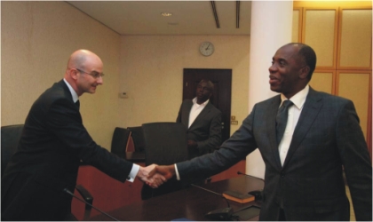 FRED19081103 Rivers State Governor, Rt. Hon.Chibuike Amaechi (right) in a handshake with Lorenzo Pareja, Director, Standard And Poors, Sovereign/International Public Finance rating firm during a courtesy call at Government House, Port Harcourt, Monday.