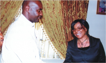 FRED24081101 Senator Magnus Abe, representing Rivers South East, receiving Barr Mrs Mina Benebo, Permanent Secretary, Ministry of Justice, Rivers State and chairperson of Permanent Secretaries during the condolence visit of the permanent secretaries to the Senator on the death of his mother, last week
