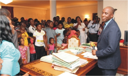 FRED29081102 Rivers State Governor, Rt. Hon. Chibuike Amaechi (right) addressing children from Christ the King Church during their one day tour of Government House, Port Harcourt, last Thursday.