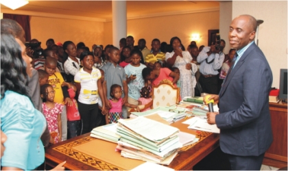 Rivers State Governor, Rt. Hon. Chibuike Amaechi (right) addressing children from Christ the King Church during their one day tour of Government House, Port Harcourt, last Thursday.