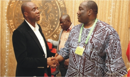 FRED31081101 Rivers State Governor, Rt. Hon. Chibuike Amaechi (left) in a handshake with Barr. Joseph B. Daudu SAN, President, Nigerian Bar Association, during a dinner with members of the NBA in Government House, Port Harcourt, last Thursday.