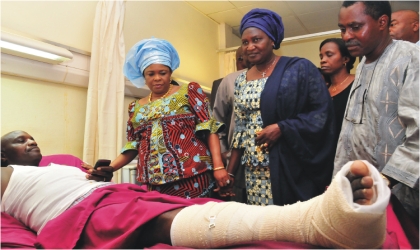 From left: First Lady, Dame Patience Jonathan, wife of the Senate President, Mrs Helen Mark; and Director, Clinical Services, National Hospital, Dr Obasi Ekunmakama, commiserating with a victim of the UN House bomb blast, during her visit to the hospital in Abuja , last Tuesday.