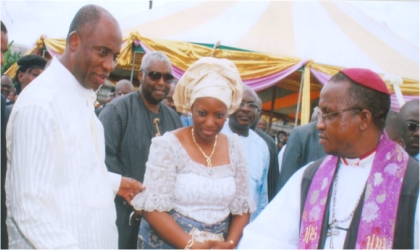 Rivers State Governor, Rt. Hon. Chibibuike Rotimi Amaechi (left) and his wife, Judith conferring with Bishop of Ogoni Anglican Diocese, Rt. Rev. Solomon Gberegbara, during the burial of the mother of Senator Magnus Abe, Late Mrs Margaret Abe, at Bera in Gokana LGA, last Saturday.