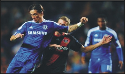 FRED14091103 Chelsea Fernando Torres (left) against Bayer Leverkusen last night