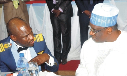 Chief of  Air Staff, Air Marshal Mohammed Umar (left) with Minister of Defence, Dr Haliru Bello at a dinner in honour of senior officers of Air Rank in Abuja, Tuesday.