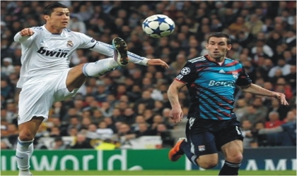 Real Madrid’s Cristiano Ronaldo showing deft control in a champions League tie. Real whipped Lyon 4-0 at Bernabeu last night